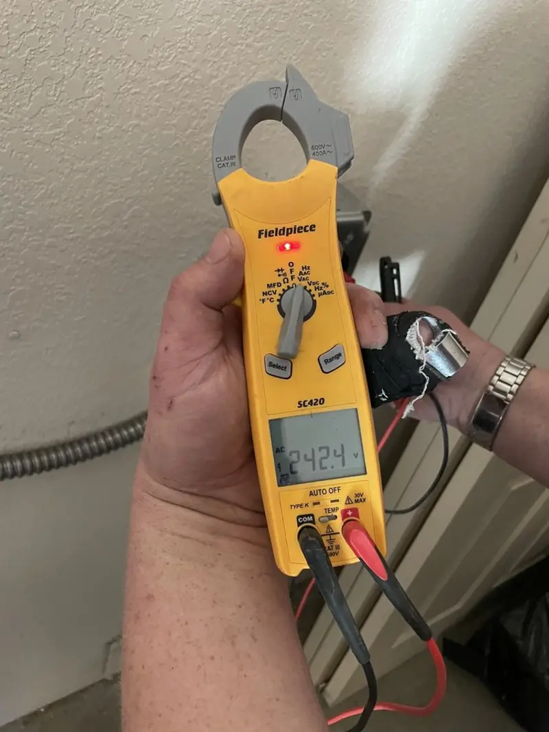 Voltage testing with clamp meter during Ceiling Fan Installation in Lake in the Hills
